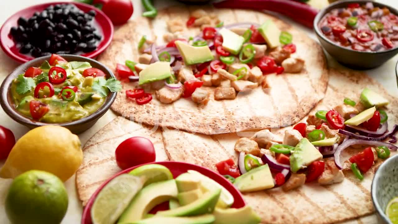 Freshly made healthy corn tortillas with grilled chicken fillet big avocado slices