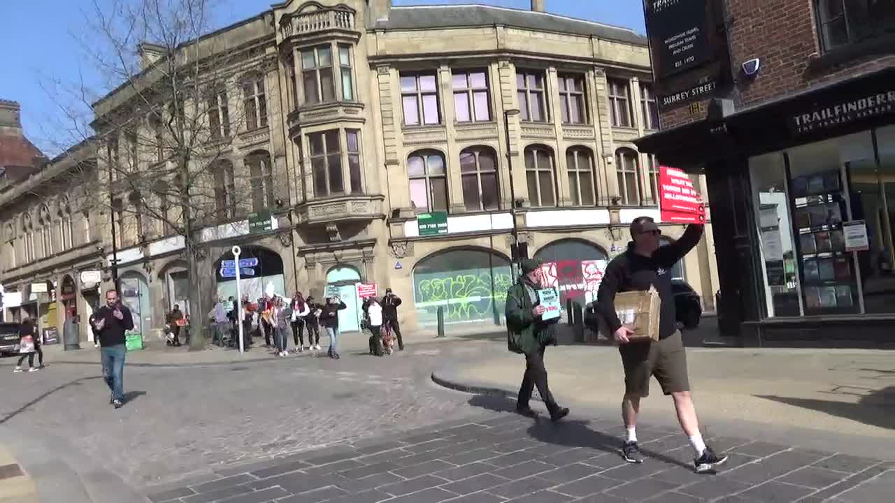 Marching Anti vaccine protest along Surrey St today in Sheffield outside the Crucible