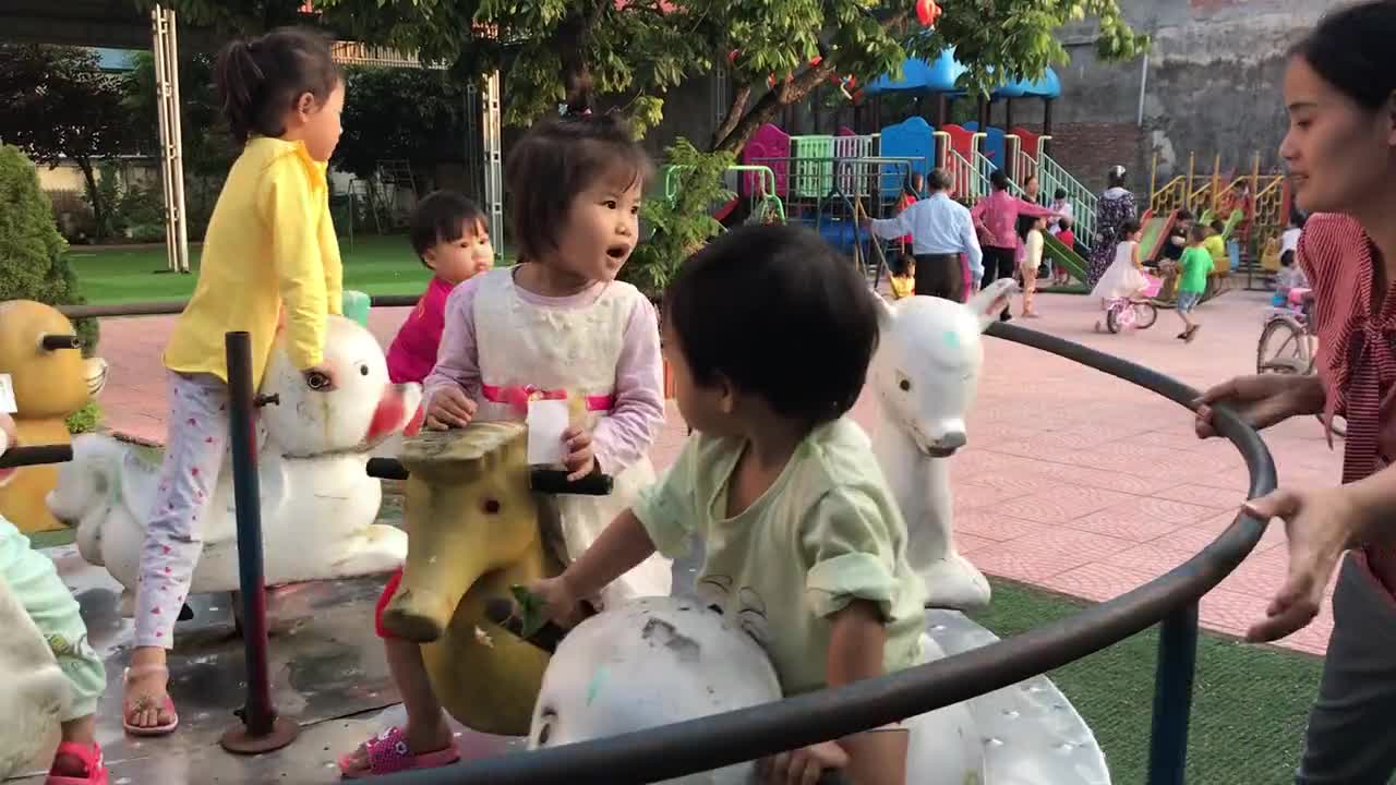 Are the beautiful kid having fun in the park. let's have fun with them.