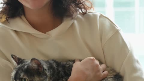woman-holding-a-cat
