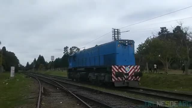 Loc EMD GM G22CW (A715) ex 7928 de ferrobaires y ex FC Urquiza pasando por Muñiz