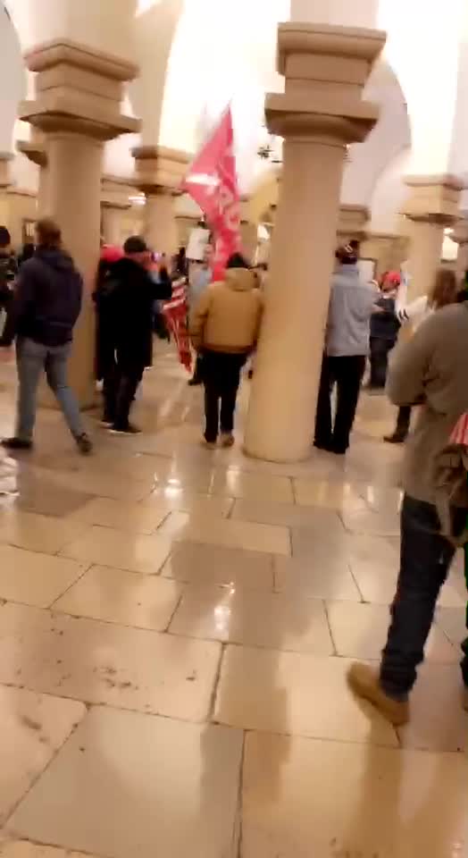 Police stand around while more people stand around: "violent insurrection"