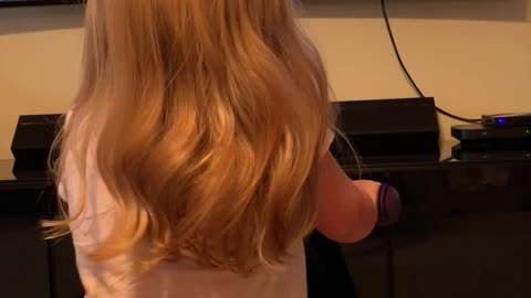 Adorable Little Girl Rides Virtual Reality Bike