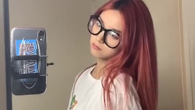 Let's show you a beautiful girl changing into an apple camera