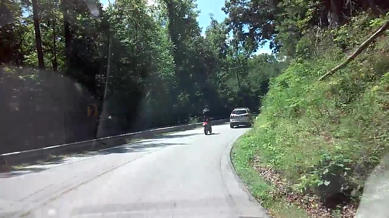 Suicidal Imbecile of the Day in a Hurry on these Narrow Winding Mountain Roads...