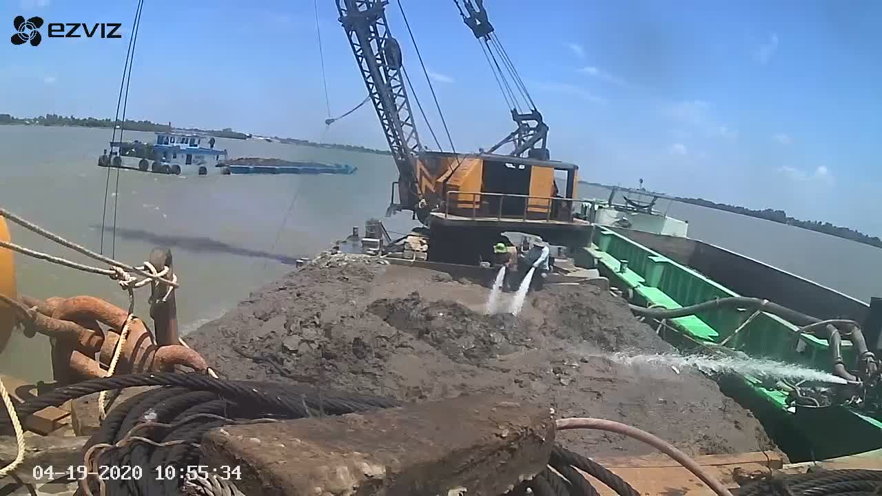 Large Crane Tips under Heavy Scoop