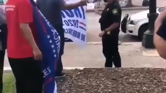 Motorist tries to tear off a Trump fan’s flag and runs into a pole by himself