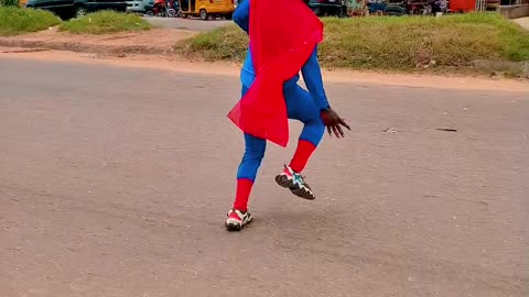 Superman in Africa trying to cross a high way 🤣🤣