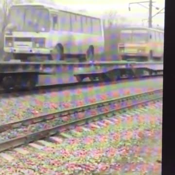 Russian army transporting civilian vehicles for use in Ukraine