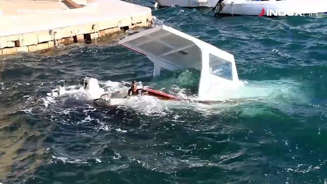 Prevrnute jedrilice i brodovi nakon oluje