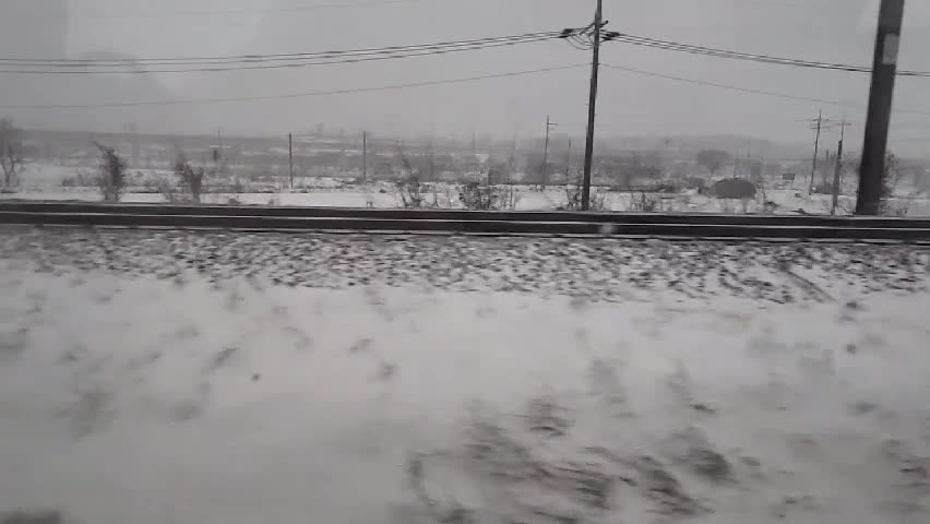 Snow scenery outside the Korean train