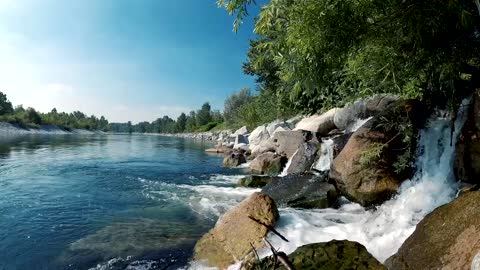 A Mini Waterfall Cascading Down To A River