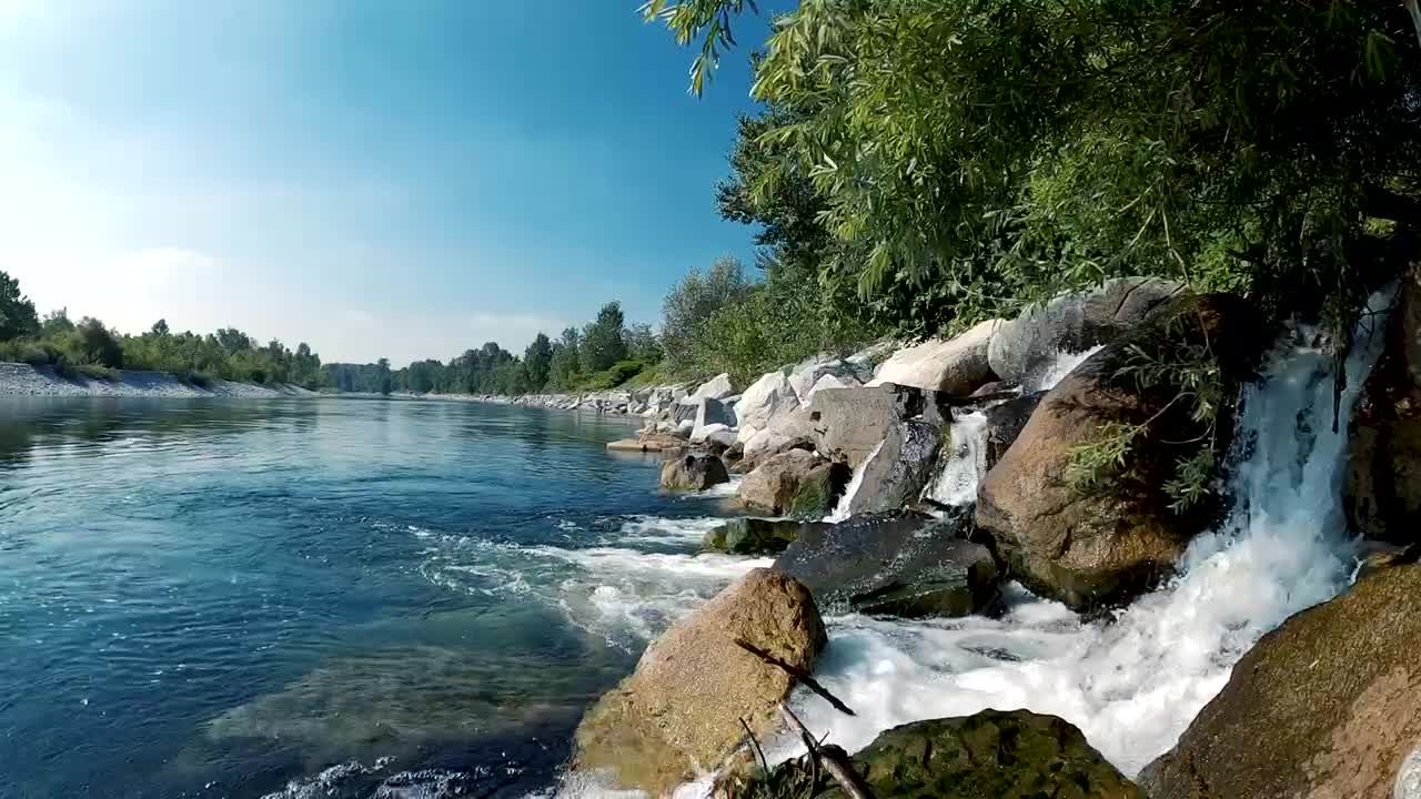 A Mini Waterfall Cascading Down To A River