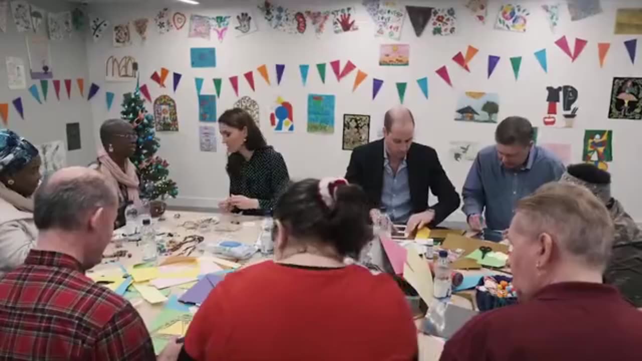 Prince William dons an apron as he serves Christmas dinner at The Passage - a homelessness charity he first visited with Princess Diana