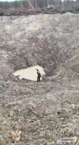 Huge bomb crater after Russian Heavy bombers' attack on Ukrainian position