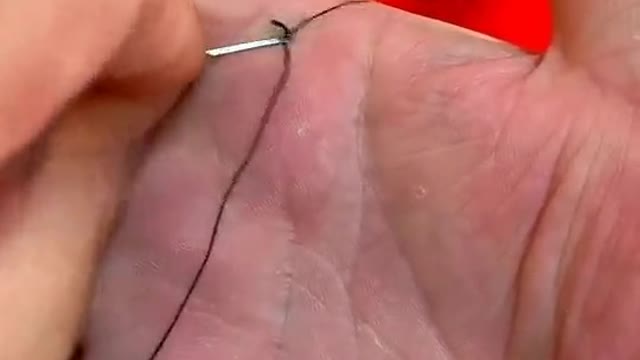 how to thread a thread into the eye of a needle