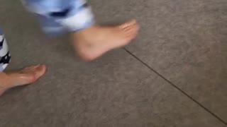 Slippery floor spray girl slips screams laugh