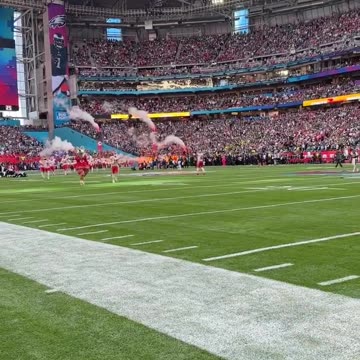 Patrick Mahome taking a knee in prayers.