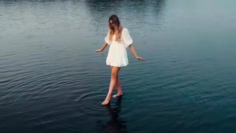 Beauty uses a stool to walk on water,