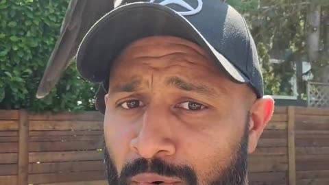 Crow Finds Perfect Perch on Man's Head