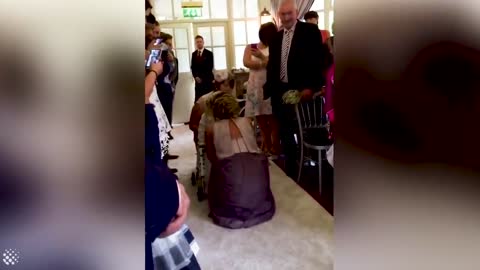 4-year-old daughter walks for the first time at mother's wedding.