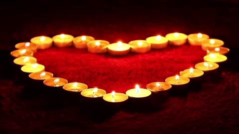 candels a heart flame