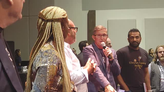 Flynn And Others Address The Media At ReAwaken America Tour