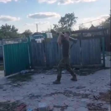Some Ukrainian men and grenade launchers.