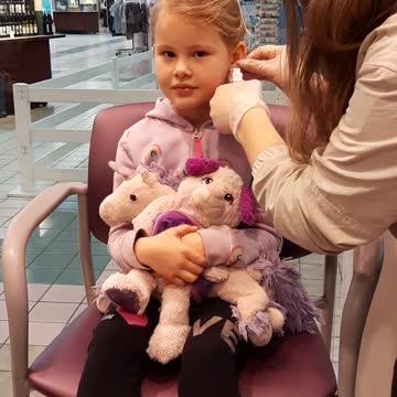 Jordan getting ears pierced
