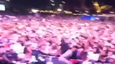 Music guy black shirt jumps from stage to crowd