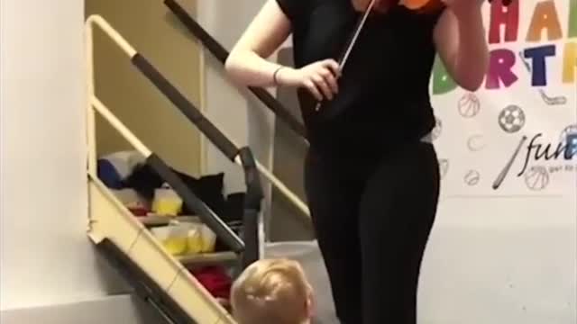 Baby's first time hearing a violin