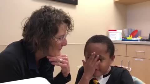 Boy with Paralyzed Vocal Chords Speaks with Electrolarynx for First Time