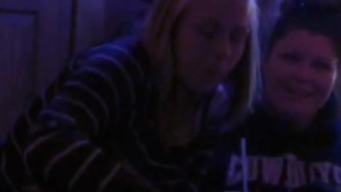 Music woman at bar does a line of shots