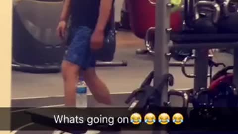 Guy uses hips to hit red punching bag