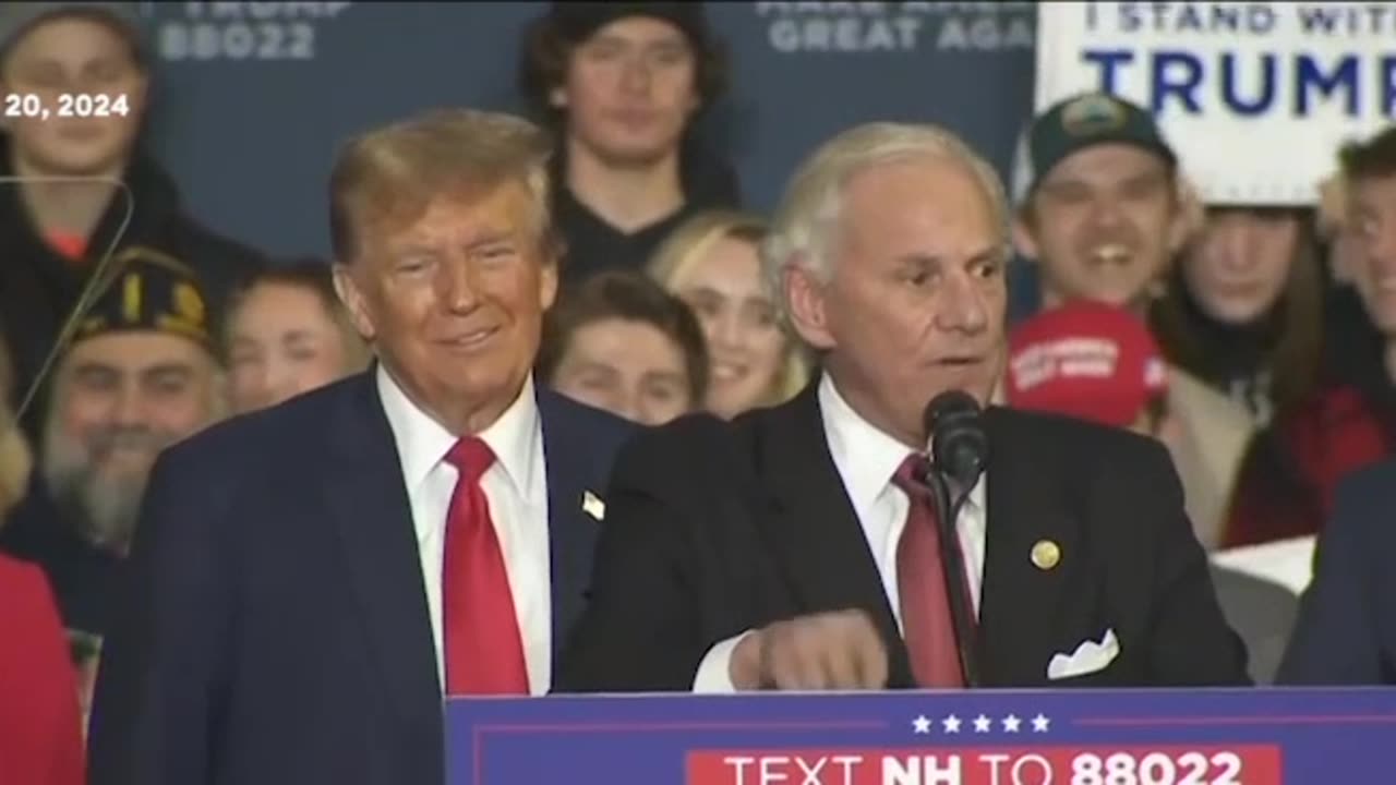 Trump onstage at a campaign rally in Manchester