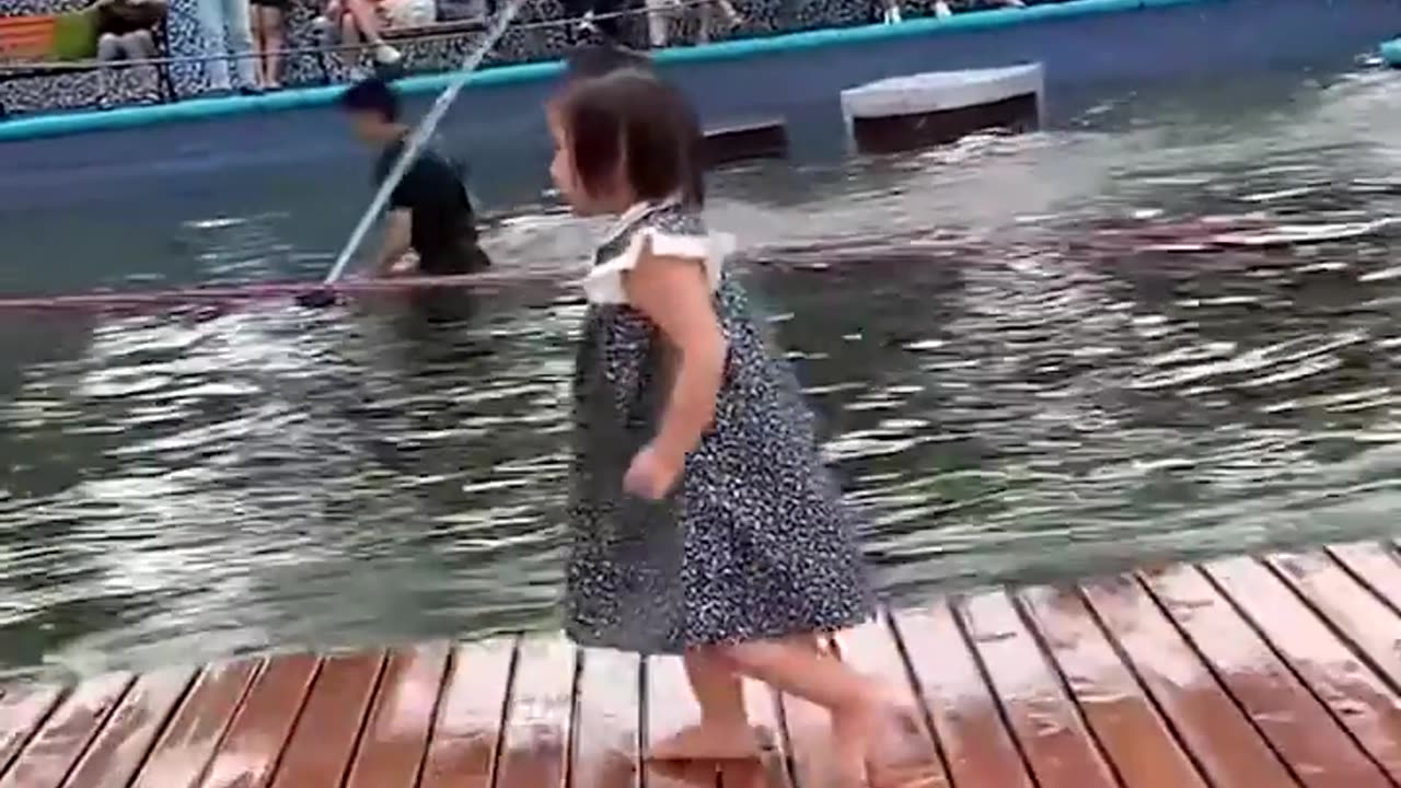 Little girl walking in a raft!