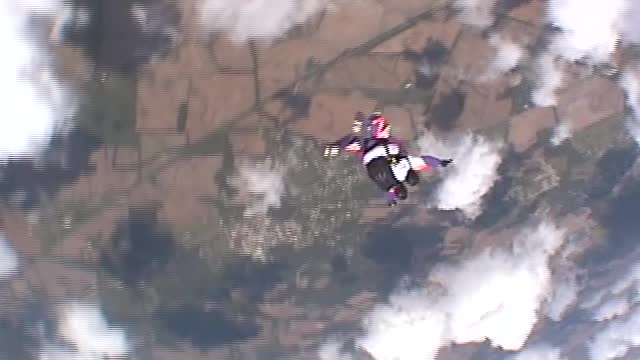 Terri Gold doing a standing rodeo skydive from the casa