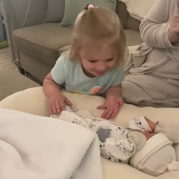 Big Sister Excitedly Meets Her Newborn Baby Brother