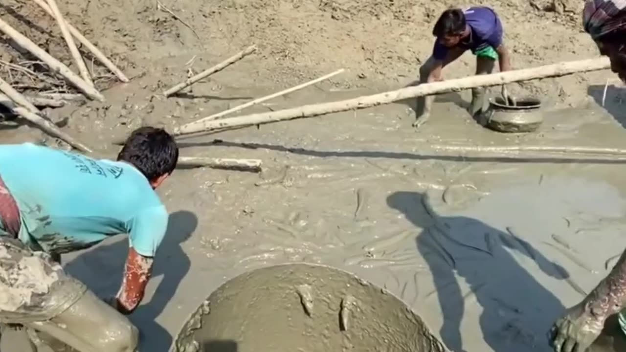 Traditional fishing in Bangladeshi river