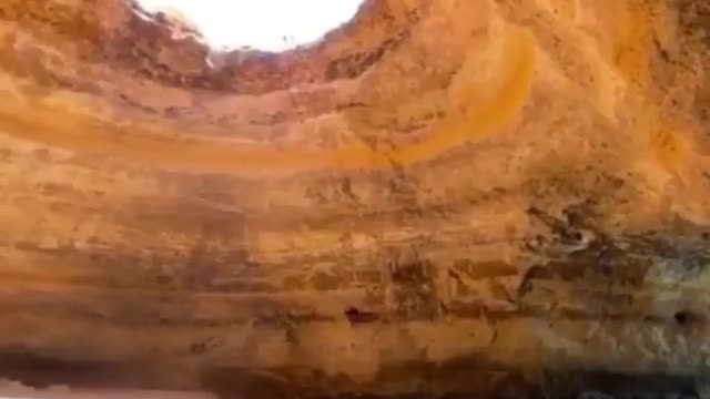 The large natural karst cave is like a hole in the sky.