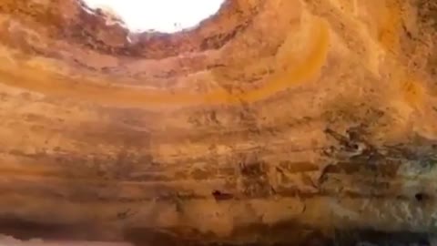 The large natural karst cave is like a hole in the sky.