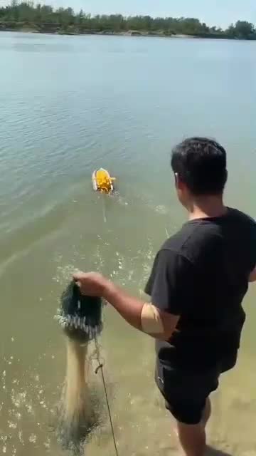 Amazing net fishing in the river.
