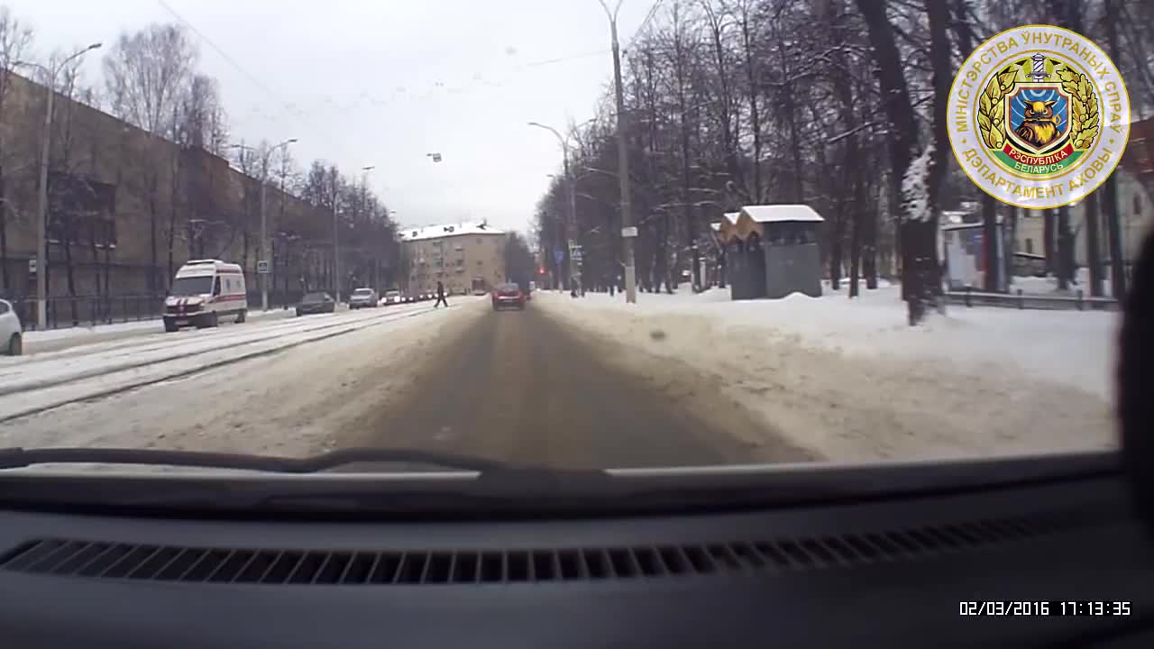 Police officer shields child while being struck by car