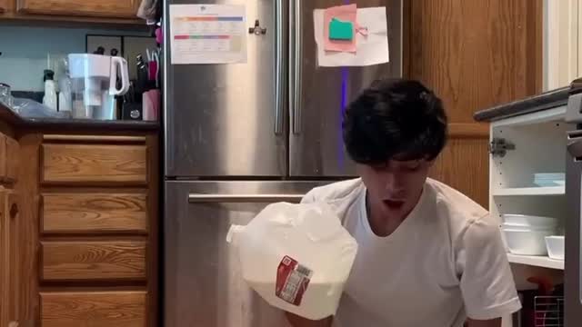 This guy trys to walk in glass