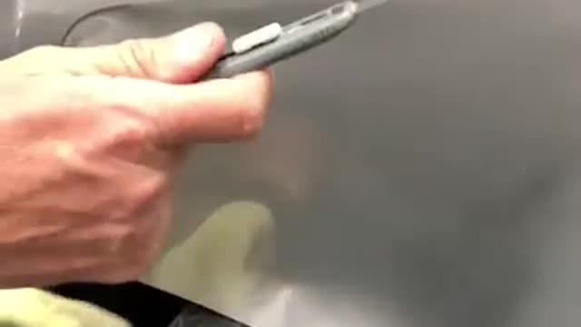 Satisfying Cutting of Wrap Vinyl Out of a Wheel Well