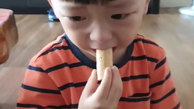 A child in sadness due to broken cookies.