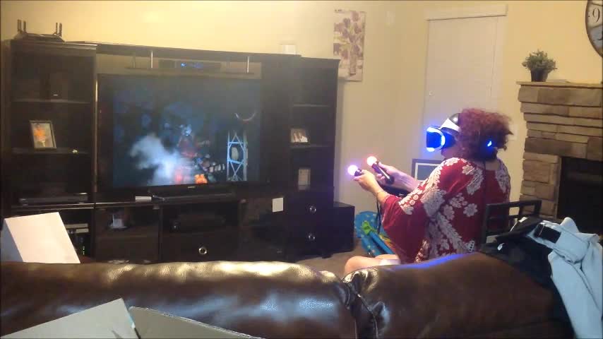 Gaming Grandma Completely Freaks Out When VR Zombies Appear On Screen