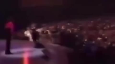 Eddie Murphy yells his phone number to Whitney Houston