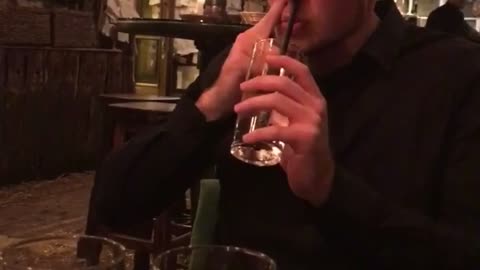 Restaurant paper all over ceilings guy drinks water from nose