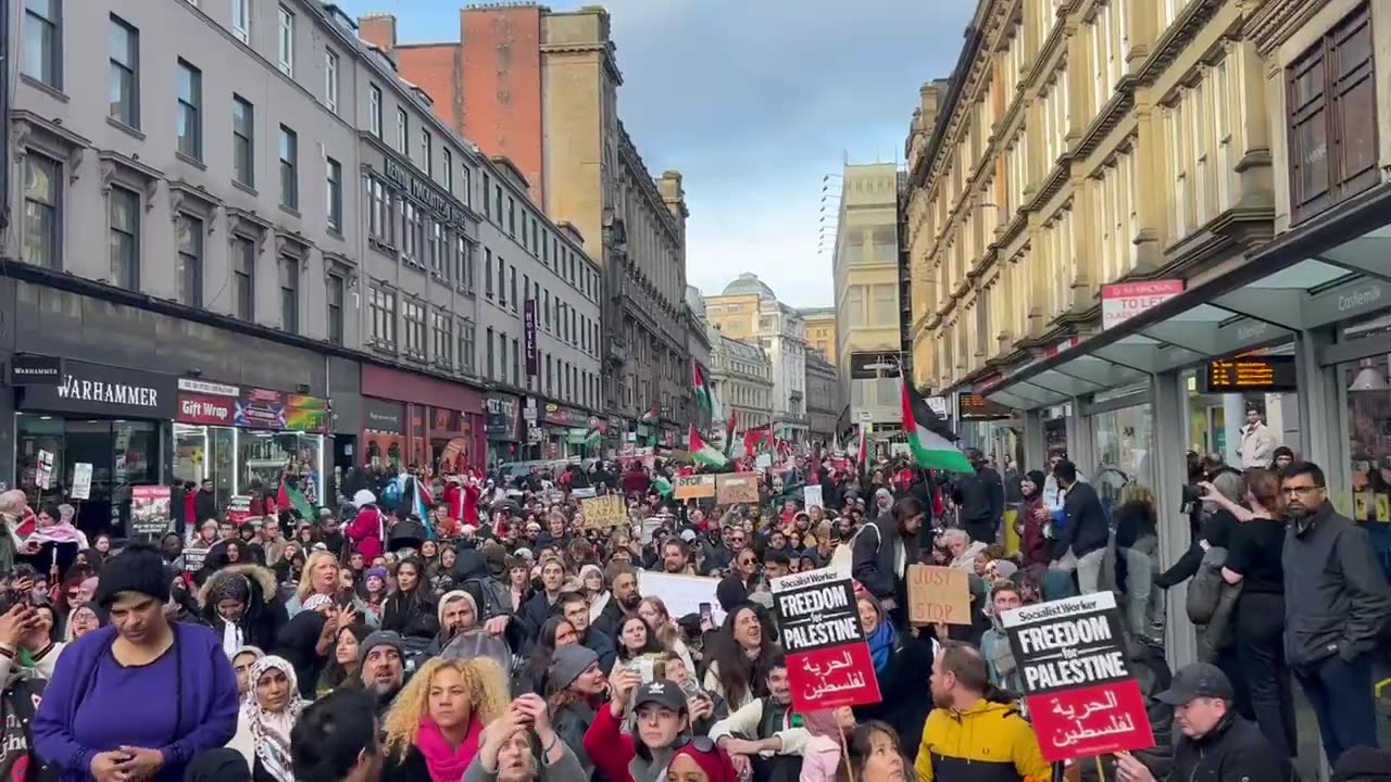 Glasgow demonstrators conduct a sit down protest in Union Street